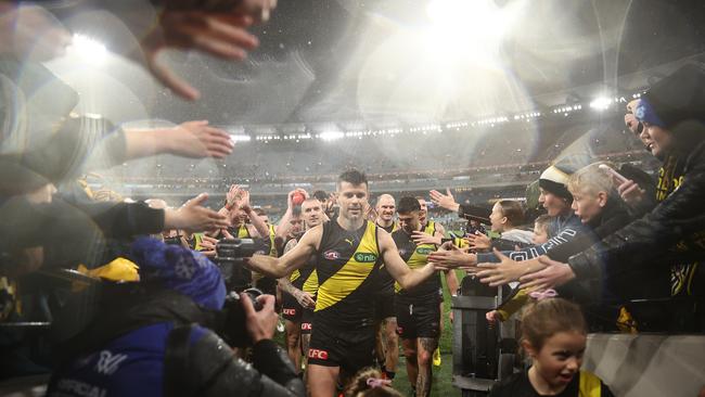 Trent Cotchin celebrates a win in game 300. Picture: Getty Images