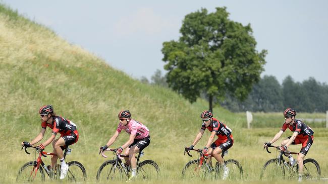 Cadel Evans with his teammates during the 10th stage of the Giro d’Italia from Modena to Salso Maggiore. Picture: AP