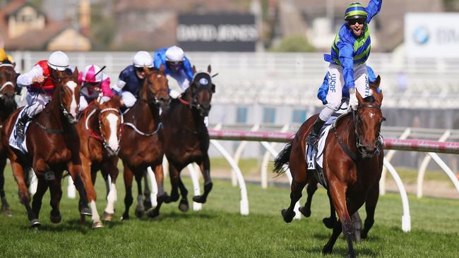 Nick Hall celebrates after winning the Caulfield Cup aboard Jameka. Picture: Getty Images