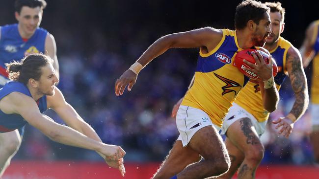 Lewis Jetta breaks away from Marcus Bontempelli. Picture: Michael Klein