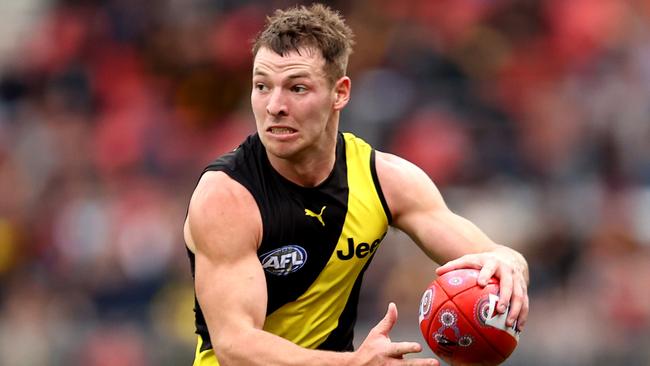 SYDNEY, AUSTRALIA - MAY 30: Jake Aarts of the Tigers controls the ball during the round 11 AFL match between the Richmond Tigers and the Adelaide Crows at GIANTS Stadium on May 30, 2021 in Sydney, Australia. (Photo by Brendon Thorne/Getty Images)