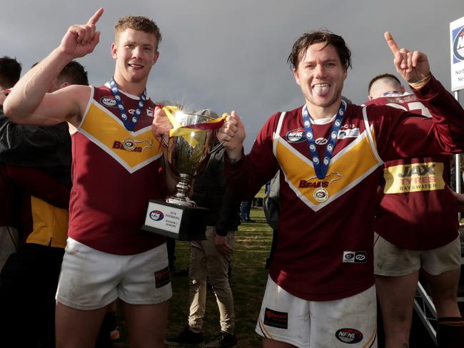 Lower Plenty players celebrate the club’s dramatic Division 2 grand final win.