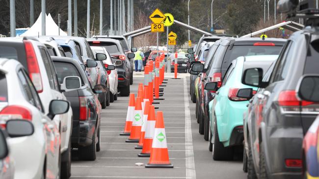 Cars line up at a pop-up COVID testing site at Shepparton Sport Precinct. Picture: David Caird