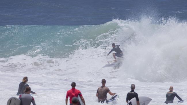 Surfers enjoying the larger swell at Snapper Rocks on Sunday 2 January 2022. Picture: Jerad Williams