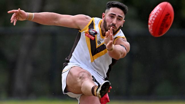 Lawrence Lopiccolo gets a kick for Thomastown. Picture: Andy Brownbill