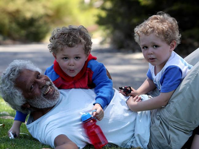 Ernie Dingo with his three-year-old twin sons Jimmy and Stewie. Picture: Colin Murty