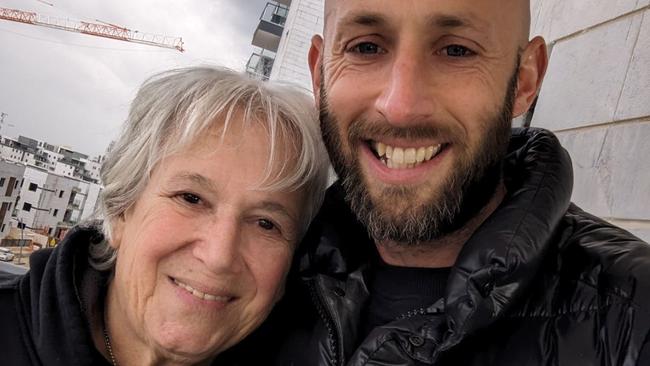 Dan Monheit from Melbourne in Israel with family matriarch Margalit Moses following her release.