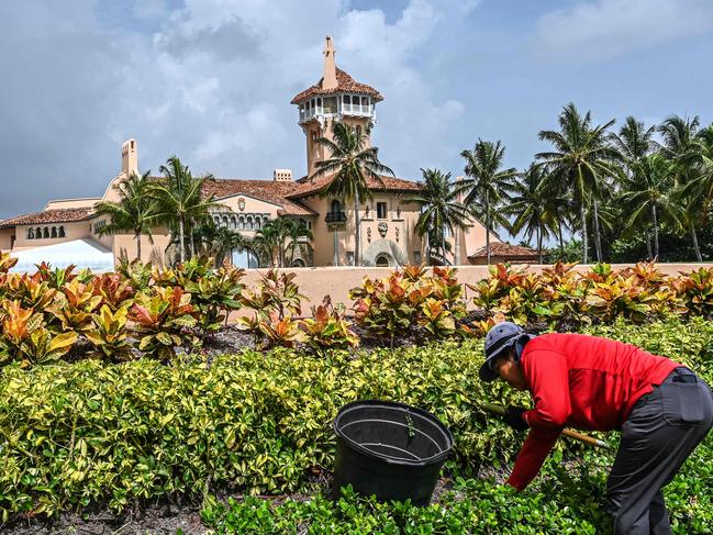 A gardener working outside former US President Donald Trump's residence Mar-A-Lago, Palm Beach, Florida, which was searched by FBI agents. Picture: AFP