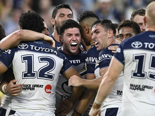 TOWNSVILLE, AUSTRALIA - MARCH 16: Chad Townsend of the Cowboys celebrates after kicking the winning field goal in extra time during the round two NRL match between North Queensland Cowboys and Newcastle Knights at Qld Country Bank Stadium, on March 16, 2024, in Townsville, Australia. (Photo by Ian Hitchcock/Getty Images)
