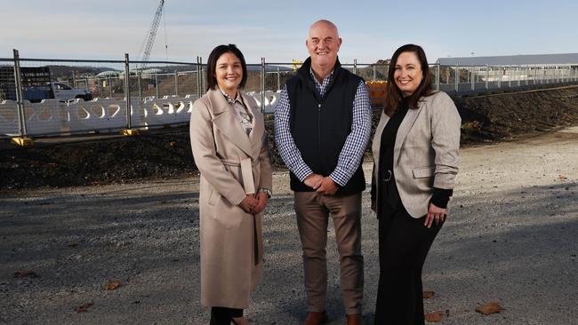 L-R Frances Hutchinson, Steve Old and Amy Hills at the Macquarie Point site of the proposed stadium. Tasmanian Hospitality Association CEO Steve Old, Tourism Industry Council Tasmania CEO Amy Hills, Business Events Tasmania Board Director Frances Hutchinson who are all backing the Macquarie Point Stadium from the perspective of tourism and hospitality opportunities it will create in Hobart and the state. Picture: Nikki Davis-Jones