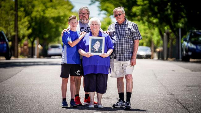 Chris McEwan, holding a picture of her daughter Sonia, with her family Edward, Greg and Roger. Picture: Mike Burton