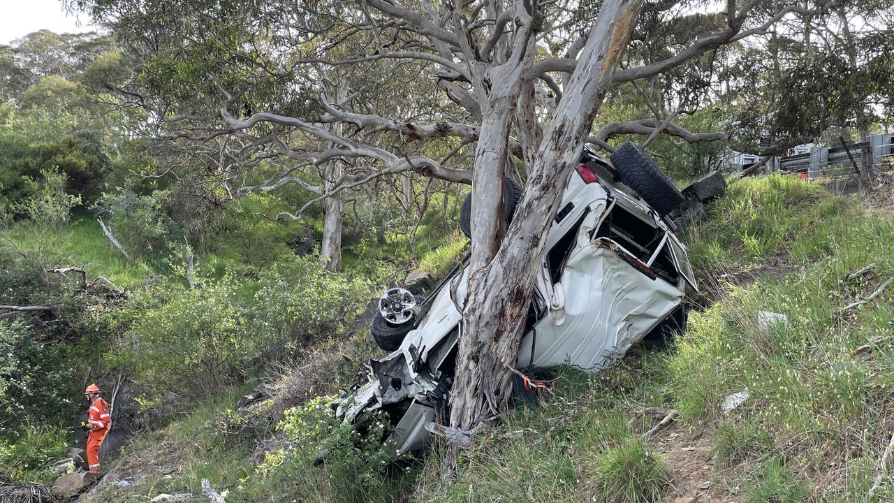 The driver of the LandCruiser was able to walk from this precarious position. Picture: Gary Juleff