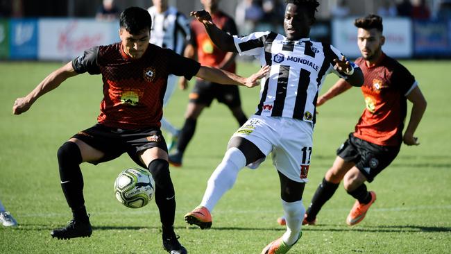 Hussain Askari in action for amateur league Ghan Kilburn City during last year’s FFA Cup SA round-of-16 clash with Adelaide City. Picture: AAP Image/Morgan Sette