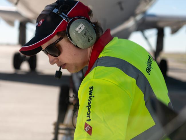 Swissport airport ground staff members Nicolas Schimming pictured working at Brisbane Airport Picture Jen Dainer