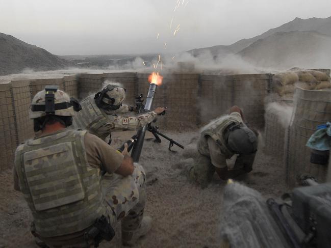 SAS soldiers of Reconstruction Task Force fire mortars on Taliban extremist positions in Baluchi, after an earlier ambush attack and rocket fire on soldiers by Taliban fighters near Tarin Kowt, Oruzgan Province of Afghanistan.