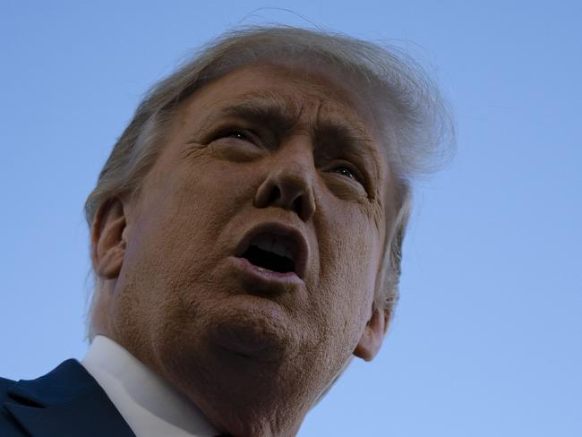 US President Donald Trump speaks with reporters on the South Lawn prior to departing the White House abroad Marine One on  September 19, 2020 in Washington, DC. - Trump is travelling to North Carolina for a campaign event before returning to Washington, DC tonight. (Photo by Alex Edelman / AFP)