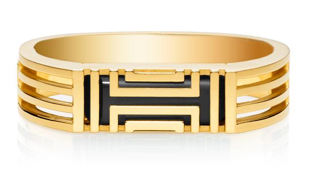 Tory Burch for Fitbit fitness tracker bracelet in gold.