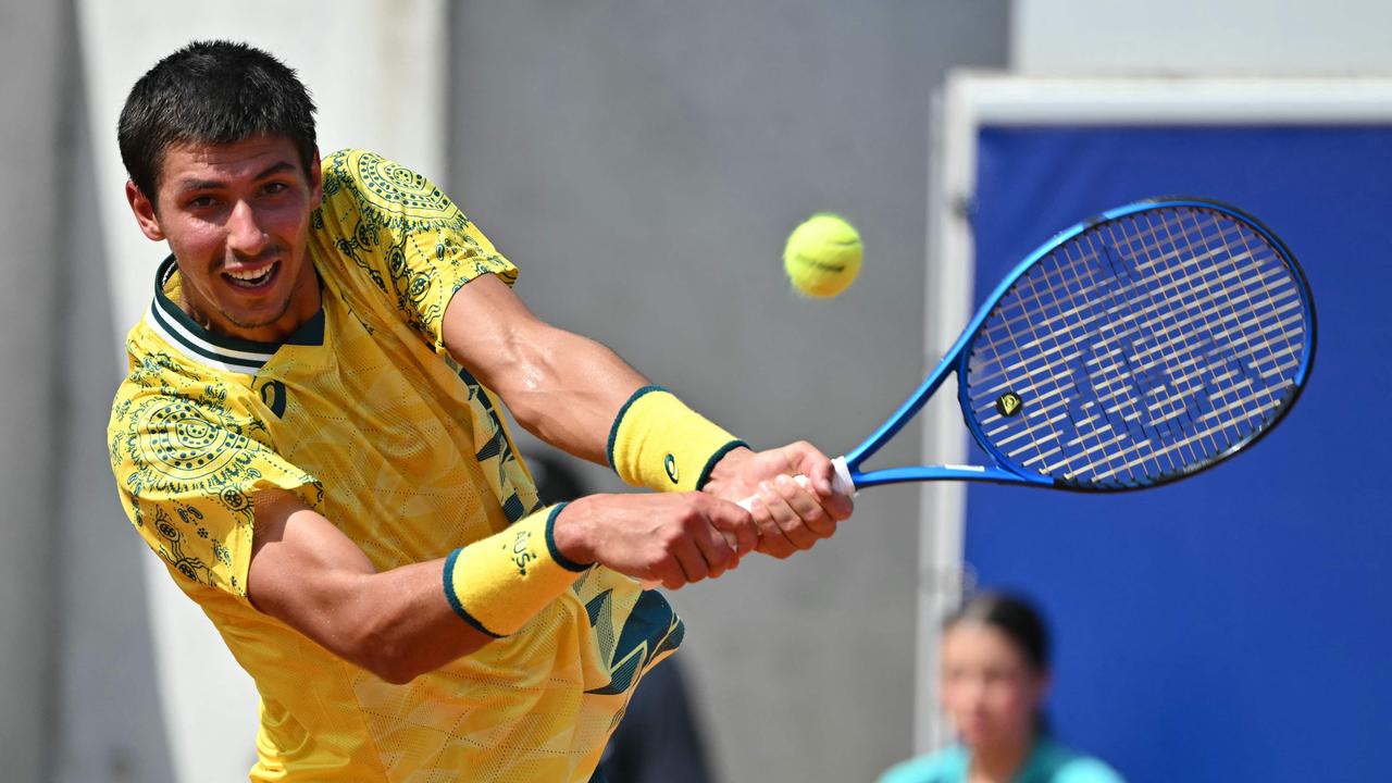 Australia's Alexei Popyrin returns to Switzerland's Stan Wawrinka during their men's singles second round tennis match. Picture: Miguel Medina/AFP