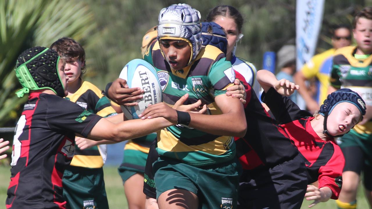 King of the Country U/13 Rugby Union tournament at Overall park Southport. Surfers Paradise(Yellow Green ) V Far North Coast (red black). Picture Glenn Hampson