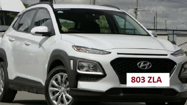 Police have released an image of the suspected stolen vehicle involved in the death of a police officer – a white Hyundai Kona displaying a Queensland registration plate of 803ZLA.