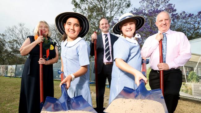 Front L to R: Izzy Kneebone, 10, Annabelle Edmonds, 9.<br/>Back L to R: Helen Spain, Board Chair; Danny Crump, Principal, Brendan Downes, Director of Junior School. Picture: Steve Pohlner