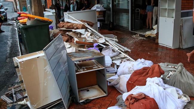 Debris outside of a beauty therapy shop at Albert street on May 23, 2025 in Taree. Picture: Roni Bintang