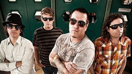 Harwell (second from right) with his Smash Mouth bandmates.