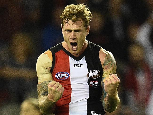 Tim Membrey of the Saints reaches after kicking a goal during the round 9 AFL match between the St Kilda Saints and Essendon Bombers at Etihad Stadium in Melbourne, Sunday, May 22, 2016. (AAP Image/Julian Smith) NO ARCHIVING, EDITORIAL USE ONLY