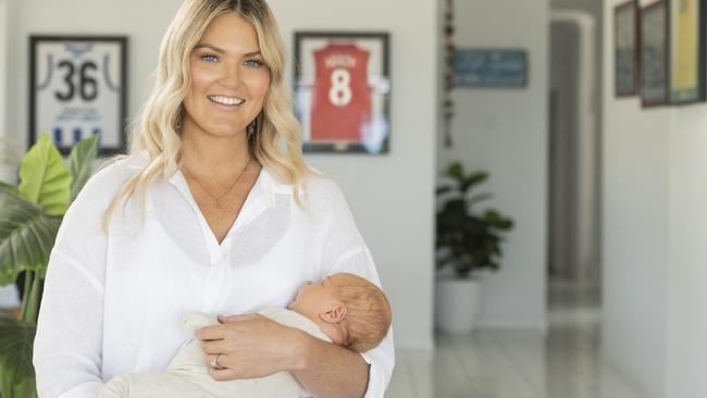 Diamonds netball star Gretel Bueta with new baby Toby, husband Niko and son Bobby, 2, is the new face of the DrinkWise campaign.