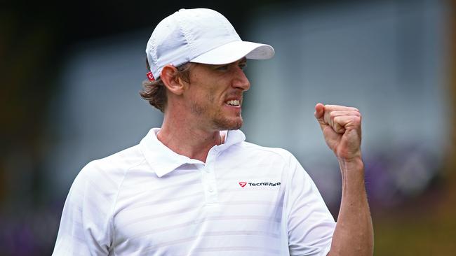 John Millman of Australia celebrates during the Men's Singles match against Benoit Pare of France on day four of the Wimbledon Lawn Tennis Championships. The Anglican Church Grammar School Old Boy has been selected to represent Australia in tennis at the Rio Olympics. Picture: <span id="U313526630173DYG" style="text-transform:uppercase;">Jordan Mansfield/Getty Images</span>