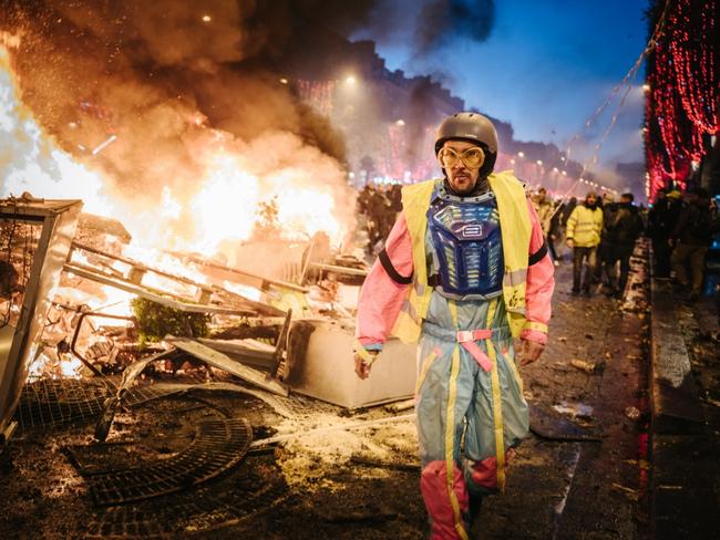 A protester of the ‘Yellow Vests’ wearing a surreal outfit in Paris on the Avenue des Champs Elysées. Picture: Arnaud Guillard