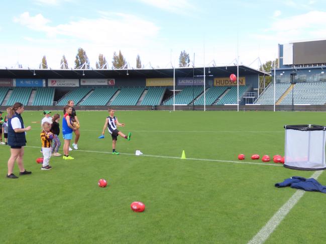 Kids taking part in drills at the Devils school holiday clinic at Launceston on Tuesday. Picture: Jon Tuxworth