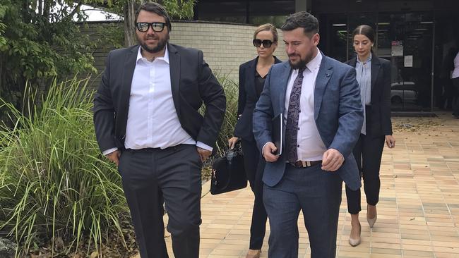 Willem Ungermann, better known as Willem Powerfish to his fans, leaving Tweed Heads Local Court with defence lawyer Corey Cullen. Picture: Jodie Callcott.