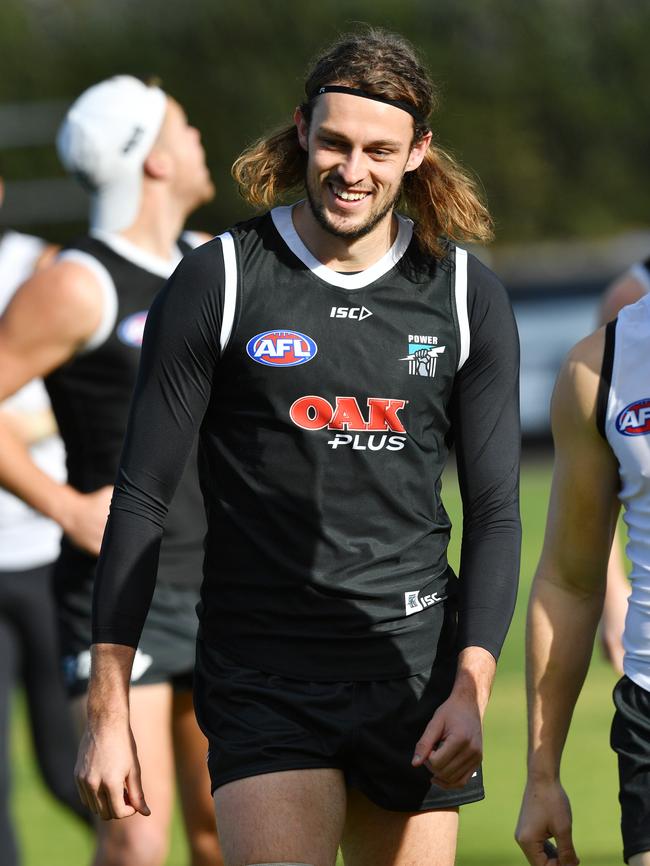 Jarrod Lienert of the Power trains at Alberton Oval on Friday. Picture: AAP Image/David Mariuz