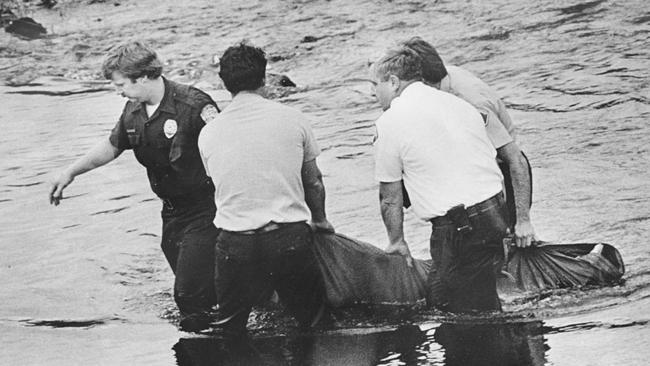 The body of Wendy Lee Coffield is removed from the Green River in Kent, Washington, in 1982.