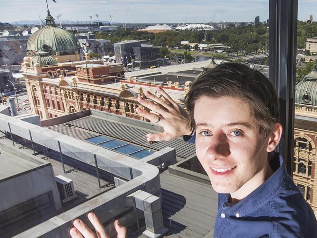 Reuben Hawkes at the city apartment he purchased last year - good window views overlooking Southbank.Picture:Rob Leeson.