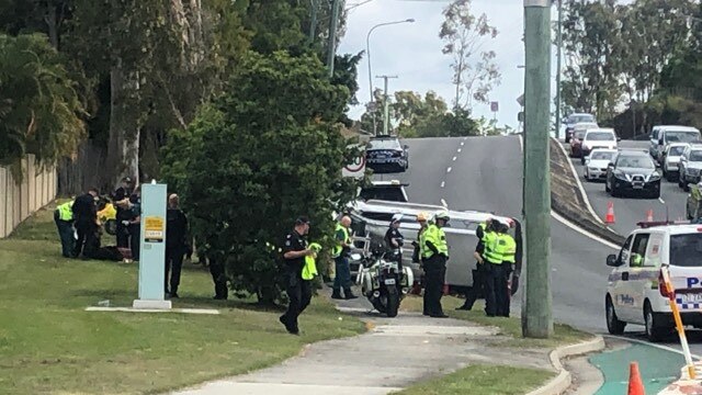 Police swarmed Helensvale Rd at Helensvale on Wednesday after a police chase involving Polair. Picture: Dean Shelton