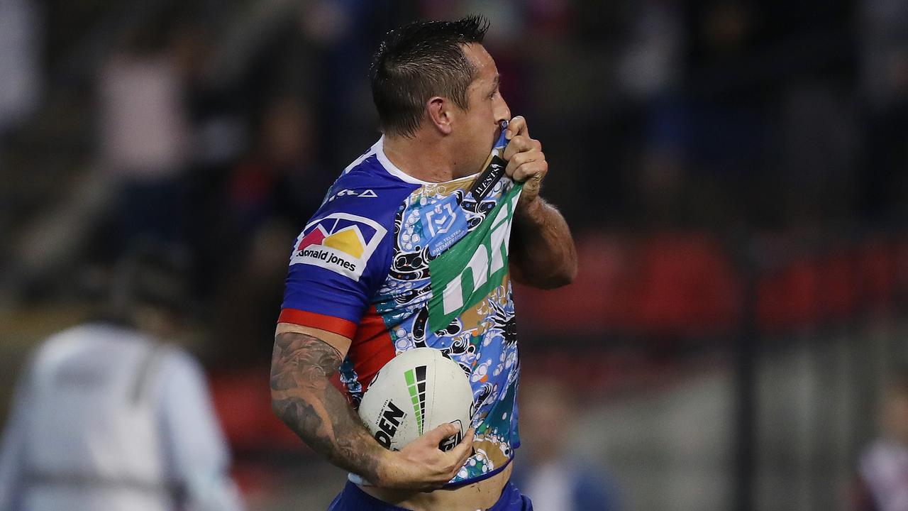 Newcastle's Mitchell Pearce scores a try during the Sydney Roosters v Newcastle Knights NRL match at McDonald Jones Stadium, Newcastle. Picture: Brett Costello