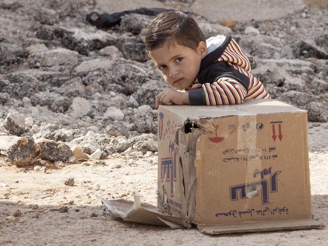 So innocent ... Twenty per cent of the refugees in the camp are aged under five. Picture: Ella Pellegrini