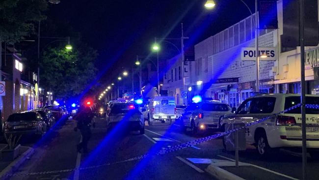 Multiple police vehicles at the scene of a Hindley St stabbing on Friday night. Picture: George Yankovich