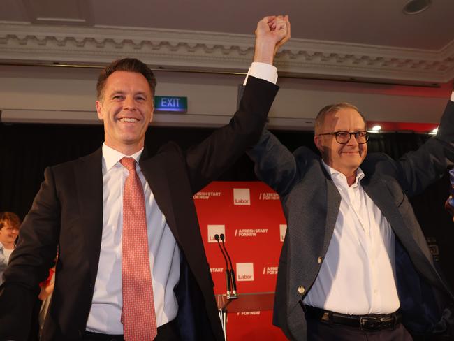 NSW Labor leader Chris Minns takes to the stage with Prime Minister Anthony Albanese after winning the election. Picture: David Swift