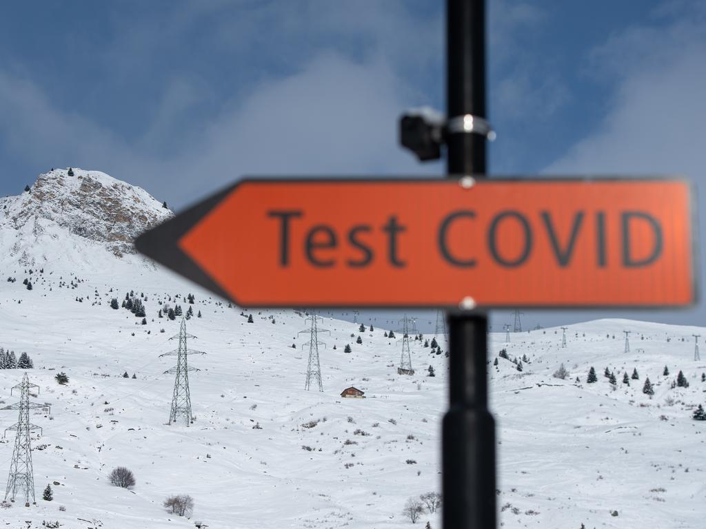 A sign pointing towards a COVID testing centre in Switzerland. Picture: Getty