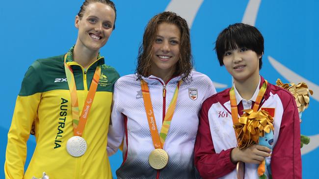 Silver medalist Ellie Cole of Australia with gold medalist Nuria Marques Soto of Spain and bronze medallist Xu Jialing of China pose for photographs at the medal ceremony for the Women's 400m Freestyle - S9 on Day 2 of the Rio 2016 Paralympic Games. Picture: Friedemann Vogel/Getty Images