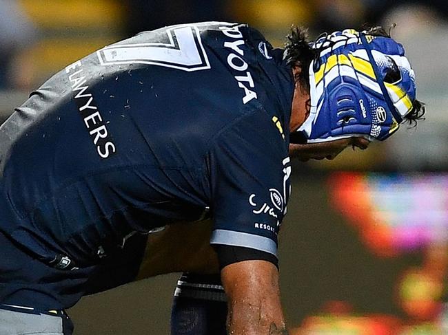 TOWNSVILLE, AUSTRALIA - MAY 25:  Johnathan Thurston of the Cowboys is hunched over after being injured during the round 12 NRL match between the North Queensland Cowboys and the Melbourne Storm at 1300SMILES Stadium on May 25, 2018 in Townsville, Australia.  (Photo by Ian Hitchcock/Getty Images)