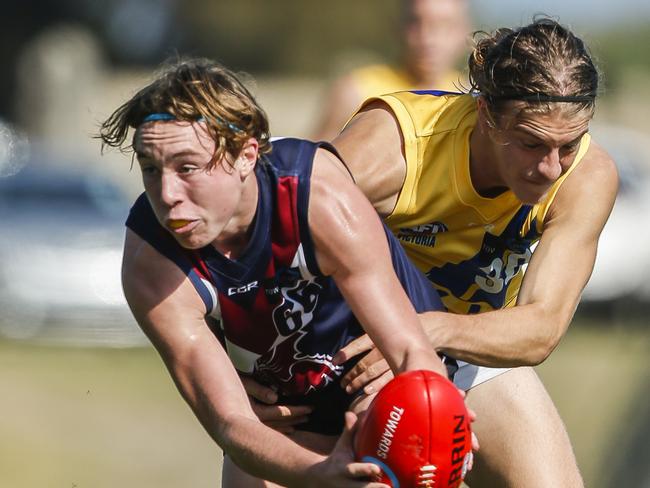 TAC football Cup: Sandringham v Western Jets. Sandringham Dragons player Ryan Byrnes and  Lachlan Pettyglove (Western Jets). Picture: Valeriu  Campan