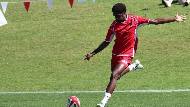 Souths Logan's Derek Ahwang, of Ipswich Grammar School, kicking for goal.