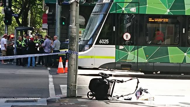 A wrecked pram lay on the street in the aftermath. Picture: AAP Image/Julian Smith