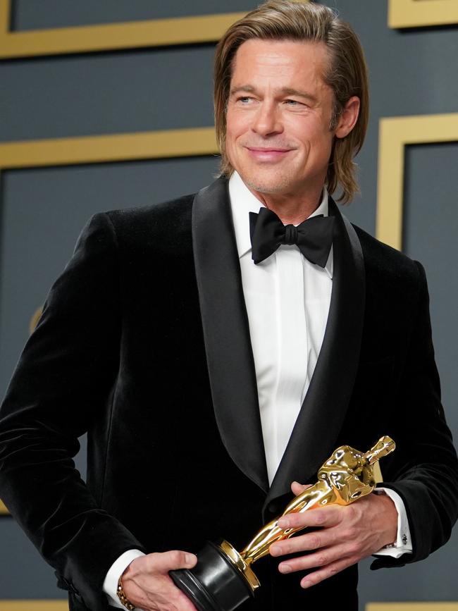 Brad Pitt, winner of the Actor in a Supporting Role award for 