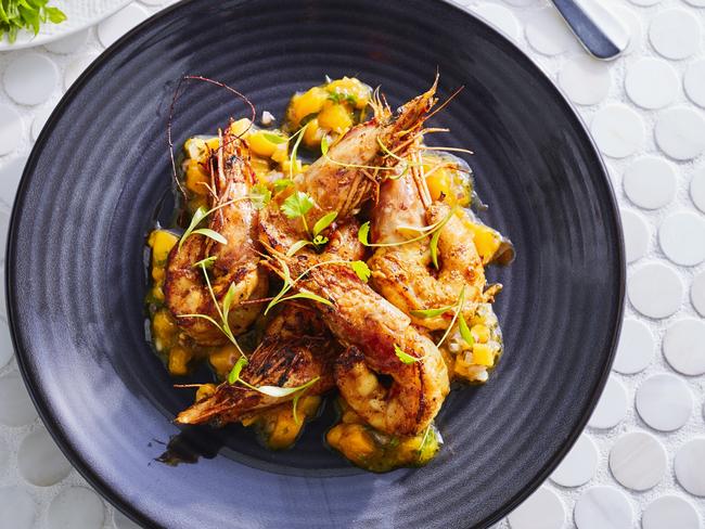 Charcoal grilled charmoula prawns and salad at East Village Sydney hotel, Darlinghurst. Picture: Brett Stevens