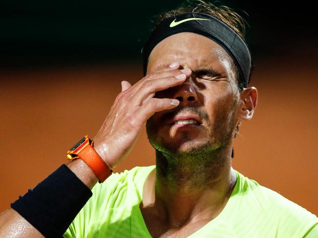 Spain's Rafael Nadal reacts after losing a point to Argentina's Diego Schwartzman during their quarter final match of the Men's Italian Open at Foro Italico on September 19, 2020 in Rome, Italy. (Photo by Clive Brunskill / POOL / AFP)